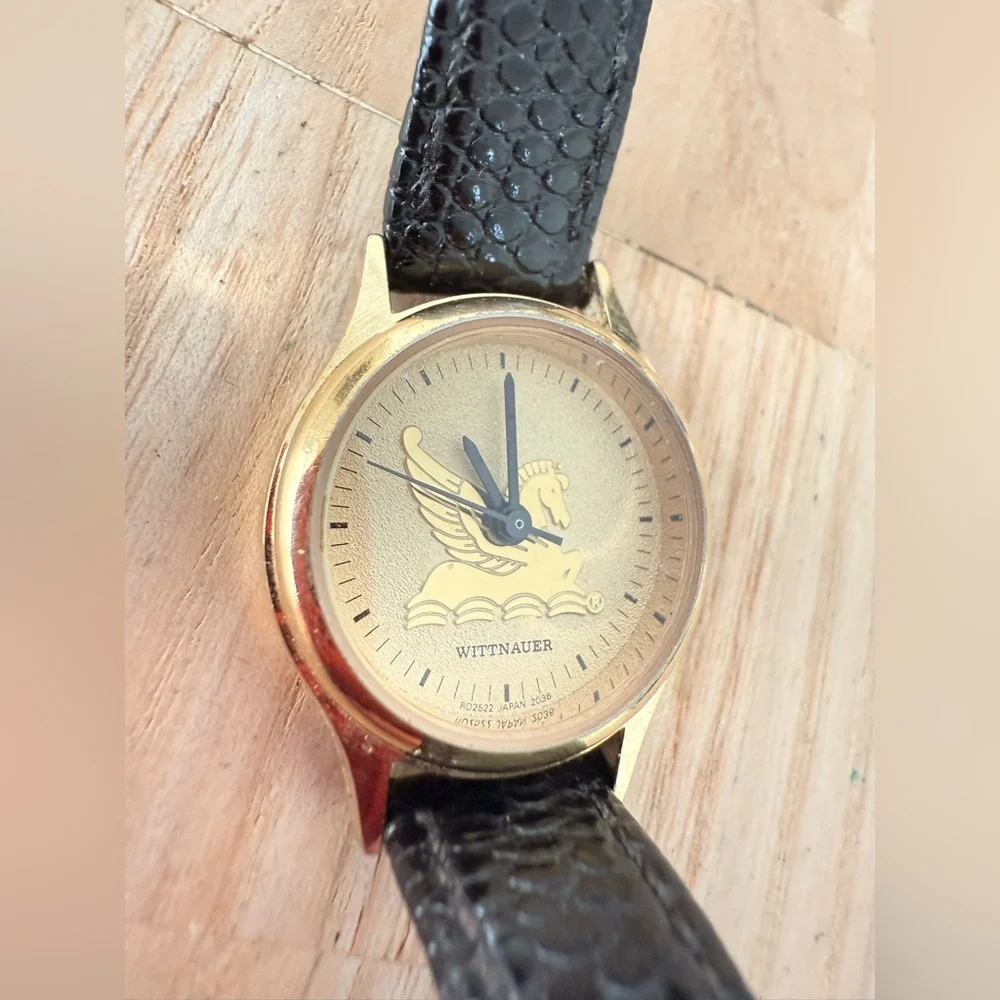 Wittnauer ladies gold tone Pegasus black leather watch NEW BATTERY